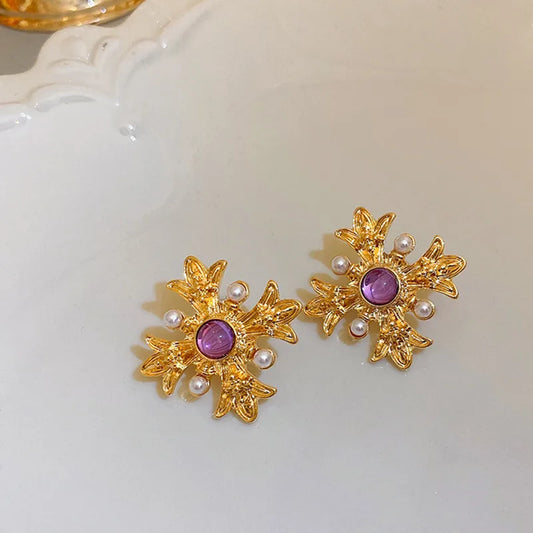 Aretes Cruz